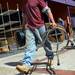 A contractor salvages bar stools for creditors of Dream Nite Club who came to collect items from the club on Monday morning.  Melanie Maxwell I AnnArbor.com